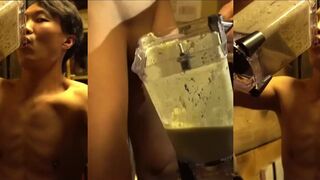 An Asian boy is drinking a smoothie...